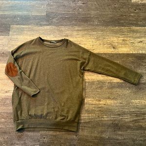 Green sweatshirt with faux leather elbow patches.
